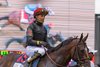 Golden Tempo and jockey In the winners circle after winning the Woodford Reserve 152nd Kentucky Derby.