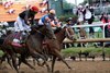 Kentucky Derby presented by Woodford Reserve, (G1) winner Jose Ortiz, aboard Golden Tempo, left, looks over to second-place finisher brother, Irad Ortiz, Jr., on Renegade, right, after crossing the finish line at Churchill Downs in Louisville, Ky., on May 2, 2026.