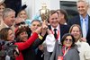 Trainer Cherie DeVaux, left, celebrates in the winner’s circle with jockey Jose Ortiz, and Golden Tempo connections Vincent Viola, Ogden Phipps II, Teresa Viola, and Daisy Phipps Pulito, right, after winning the Kentucky Derby, presented by Woodford Reserve, (G1) with Golden Tempo at Churchill Downs in Louisville, Ky., on May 2, 2026.
