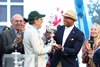 Maryland Governor Wes Moore hands the Preakness Trophy to Owner Al Gold after Napoleon Solo #10 with Paco Lopez riding won the $2,000,000 Grade I Preakness Stakes at Laurel Racecourse on Saturday May 16, 2026. Photo By Bill Denver/EQUI-PHOTO