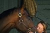 A kiss for Englishman from trainer Cherie DeVaux, the morning after Englishman won the Woody Stephens (G1) at Saratoga in Saratoga Springs, N.Y., on June 7, 2026.