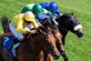 Dr Rascal (Kaiya Fraser (nearest) beats Haffner (Ryan Moore, centre) and Al Hudaiba in the Vintage Stakes
Goodwood 28.7.26 Pic: Edward Whitaker