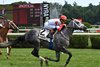 Movin' On Up wins the 2026 Caress Stakes at Saratoga Race Course