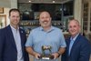 Greg Kilka (center) receives the 2023 New Jersey Breeder of the Year award from David O’Farrell (left) and Bradley Purcell (right)