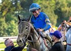 Jockey Junior Alvarado aboard Sovereignty heads to the winners circle after winning the 99th running of The Whitney at the Saratoga Race Course Saturday Aug.6, 2026 in Saratoga Springs, N.Y.