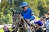 Jockey Junior Alvarado aboard Sovereignty heads to the winners circle after winning the 99th running of The Whitney at the Saratoga Race Course Saturday Aug.6, 2026 in Saratoga Springs, N.Y.