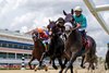 Horses race into the clubhouse turn over the Tapeta track on Monday, August 3, 2026 at Gulfstream Park