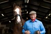 Monty Roberts, the original horse whisperer with Threebagsue a 2yo filly trained by Stan Moore
Lambourn 13.10.16 Pic: Edward Whitaker