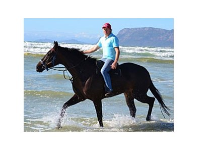 Ebony Flyer and trainer Justin Snaith at the beach in Cape Town