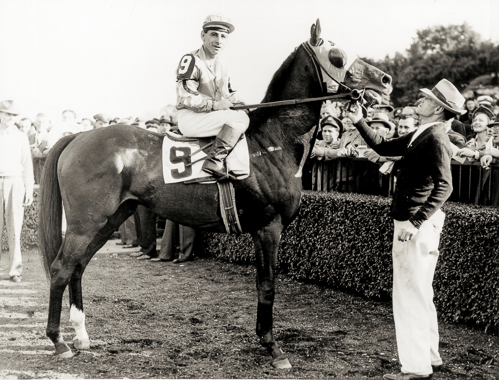 Count Fleet,winner of 1943,Kentucky Derby,KY,Jockey on horse after race