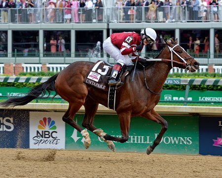Rosie Napravnik wins the 2014 Kentucky Oaks aboard Untapable at Churchill Downs