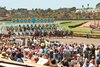 The field breaks from the starting gate and after one time around the mile oval, Kirk and Judy Robison&#39;s Casa de Cambio (orange saddle towel) and Joel Rosario win the opening race of the 2013 Del Mar Thoroughbred Club&#39;s summer racing season in Del Mar, CA.