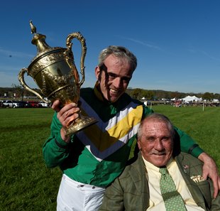Irv Naylor celebrates with jockey Ruby Walsh after winning the 2016 Grand National with Rawnaq at Far Hills Race meeting