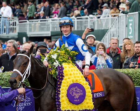 Tepin in the winner's circle after the 2015 Breeders' Cup Mile at Keeneland