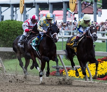 Cloud Computing with jockey Javier Castellano, stalks the leaders Always Dreaming and Classic Empire in to the Clubhouse turn on the way to the win the 142nd running of the Preakness Stakes Saturday May 20, 2017 at Pimlico Race Course in Baltimore, MD.