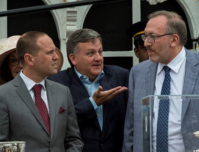 Cloud Computing's trainer Chad Brown, left speaks with co-owner Bill Lawrence, center and Seth Klarman after winning the 142nd running of the Preakness Stakes Saturday May 20, 2017 at Pimlico Race Course in Baltimore, MD.  