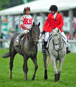 Cloud Computing and Javier Castellano on their way to the winners' circle, after winning the 142nd Preakness Stakes
