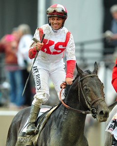  Javier Castellano on his way to the winners' circle
