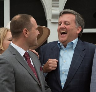 Cloud Computing's trainer Chad Brown, left laughs with co-owner Bill Lawrence after winning the 142nd running of the Preakness Stakes Saturday May 20, 2017 at Pimlico Race Course in Baltimore, MD.  