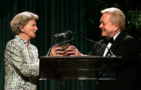 Secretariat owner Penny Chenery receives an Eclipse Award from Dave Johnson at the 35th Eclipse Awards