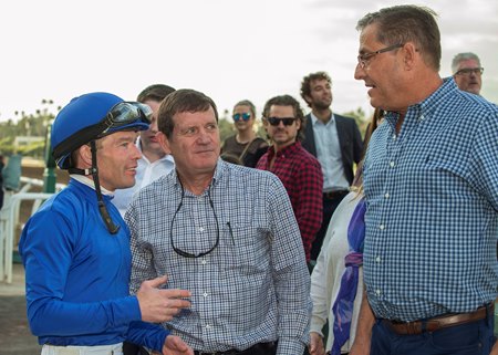 Keith Abrahams (center) with jockey Tyler Baze and trainer John Sadler