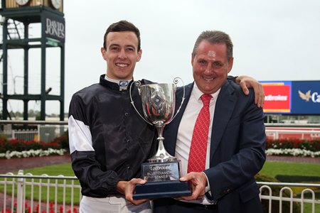 Jordan Childs and Grahame Begg, the rider and trainer of Splash Back, celebrate a victory in the 2018 Blue Diamond Stakes at Caulfield Racecourse