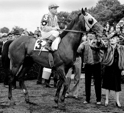 Count Fleet,winner of 1943,Kentucky Derby,KY,Jockey on horse after race