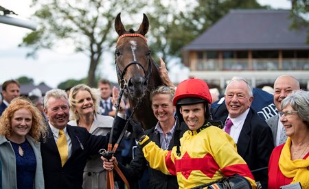 Jockey Graham Lee and the connections of Alpha Delphini after winning the 2018 Nunthorpe at York