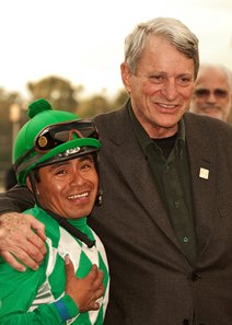 John Harris (right) with jockey Martin Garcia, after Harris Farms' homebred John Scott won the 2013 Crystal Water Stakes at Santa Anita Park