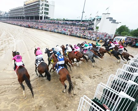 The Churchill Downs starting gate opens in front of a crowd of 150,729 at the 2019 Kentucky Derby