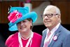 Debby and John Oxley pose for a photo in the paddock before the 145th Longlines Kentucky Oaks at Churchill Downs during Derby week 2019 on May 3, 2019 in Louisville, Ky. 
