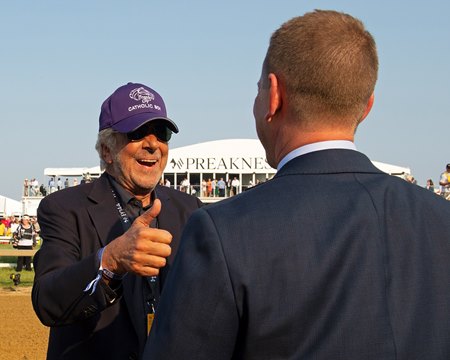 Owner Robert LaPenta gives a thumbs-up after a win at Pimlico Race Course