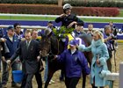 Lord Derby walks Ouija Board into the winner&#39;s circle after the 2006 Breeders&#39; Cup FIlly &amp; Mare Turf