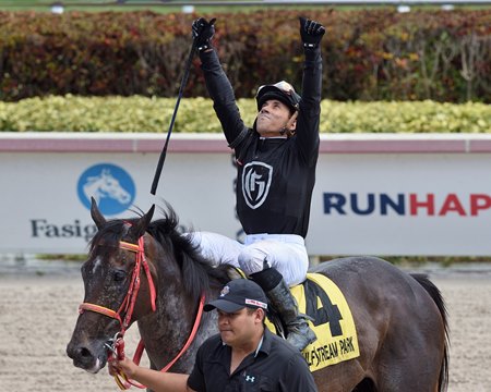 Marcos Meneses celebrates his Hal's Hope score aboard Identifier at Gulfstream Park