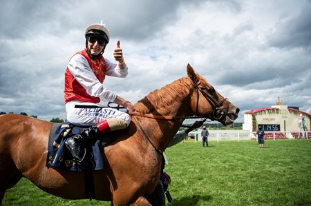 Adam Kirby celebrates his win aboard Golden Horde in the Commonwealth Cup at Royal Ascot 