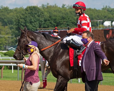 Tom Amoss (right) with Serengeti Empress after winning the Ballerina Stakes at Saratoga Race Course