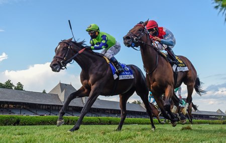 Rushing Fall (outside) edges past Mean Mary to win the Diana Stakes at Saratoga Race Course
