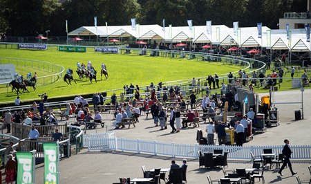 Racegoers watch the horses run by at Doncaster during last week's test event