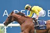 Tom Marquand  winning The Qipco British Champion Stakes on Addeybb