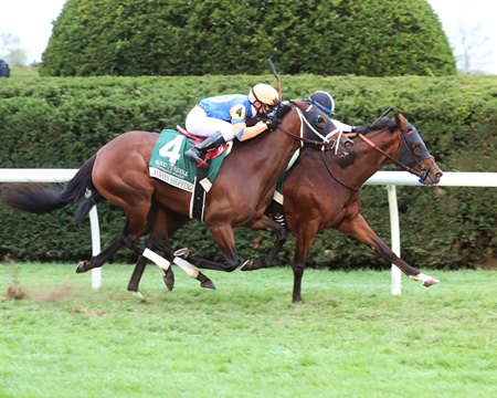 Blame Debbie (inside) holds Always Shopping at bay to win the Dowager Stakes at Keeneland 