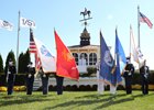 U.S. Navy Ensign Sam Hill sings the National Anthem accompanied by the United States Cyber Command, National Security Agency/Central Security Service Joint Service Color Guard led by Sergeant Marcus Goelz prior to the 145th running of the Preakness Stakes at Pimlico Race Track, Saturday, October 3, 2020 in Baltimore, MD.