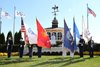 U.S. Navy Ensign Sam Hill sings the National Anthem accompanied by the United States Cyber Command, National Security Agency/Central Security Service Joint Service Color Guard led by Sergeant Marcus Goelz prior to the 145th running of the Preakness Stakes at Pimlico Race Track, Saturday, October 3, 2020 in Baltimore, MD.