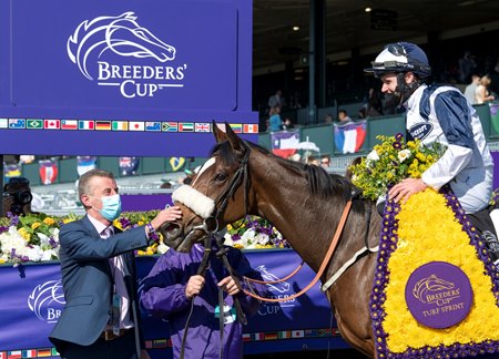Glass Slippers in the 2020 Breeders' Cup winner's circle at Keeneland