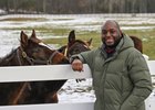 New York Thoroughbred Breeders director Najja Thompson plays with yearlings at Song Hill Farm Monday Jan 18, 2021 in Mechanicville, N.Y.    Photo by Skip Dickstein