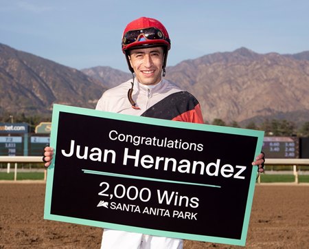 Juan Hernandez, pictured at Santa Anit Park, smiles after winning his 2,000th race