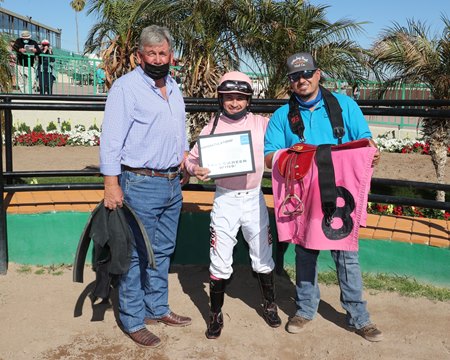 Enrique Portillo Gomez and the winning connections of South Fresno celebrate his 1,000th Thoroughbred victory in North America at Turf Paradise