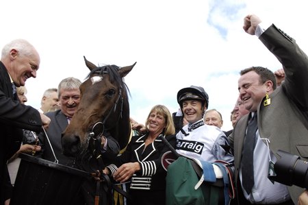 The connections of Cockney Rebel celebrate winning the 2007 Two Thousand Guineas at Newmarket Racecourse
