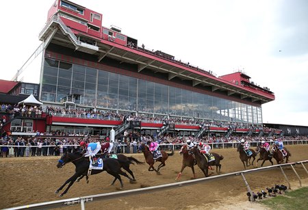 Horses race in the 2021 Preakness Stakes at Pimlico Race Course