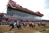 Medina Spirit #3 leads the Preakness field past the Pimlico Grandstand for the first time.  Rombauer #6 with Flavien Prat won the $1,000,000 Grade I Preakness Stakes at Pimlico Racecourse on Saturday May 15, 2021.  Photo by Bill Denver/MJC