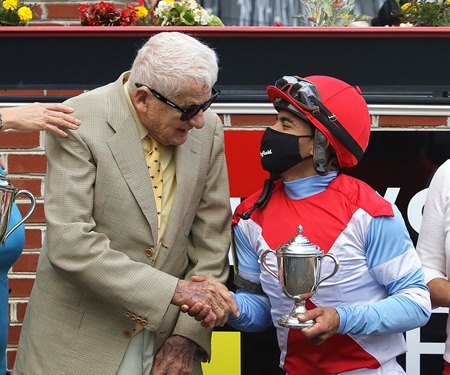 Alex Campbell Jr. congratulates jockey Luis Saez after Mean Mary's 2021 victory in the Gallorette Stakes at Gulfstream Park